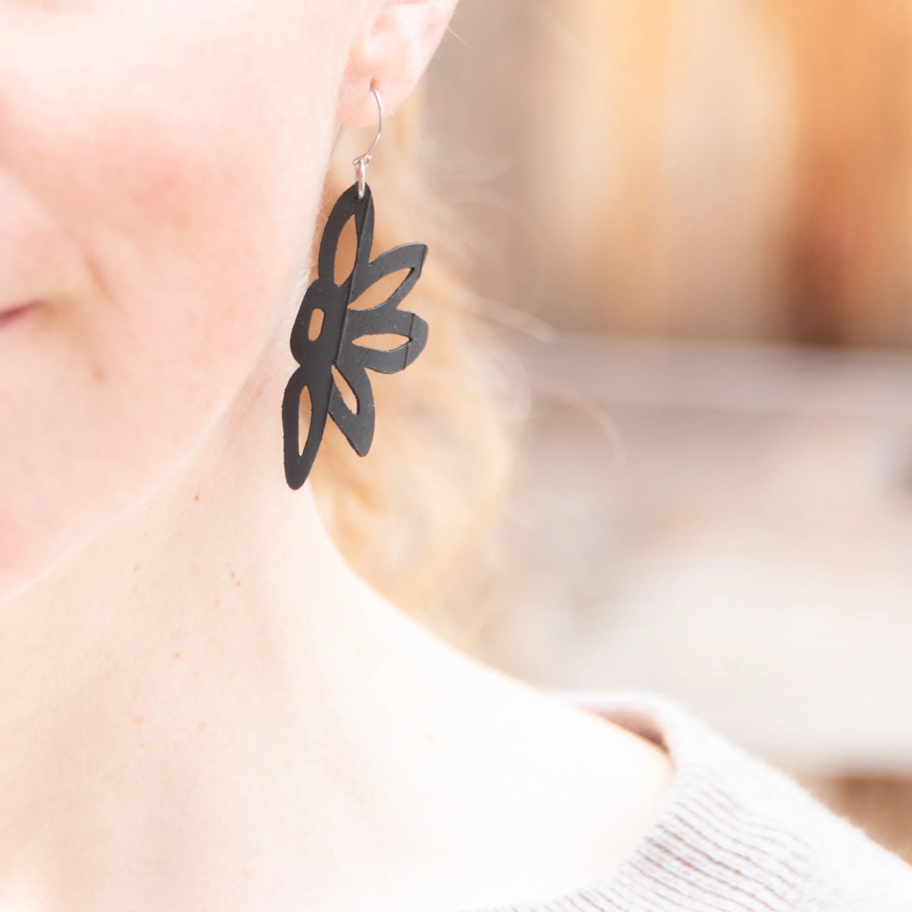 half flower rubber earring