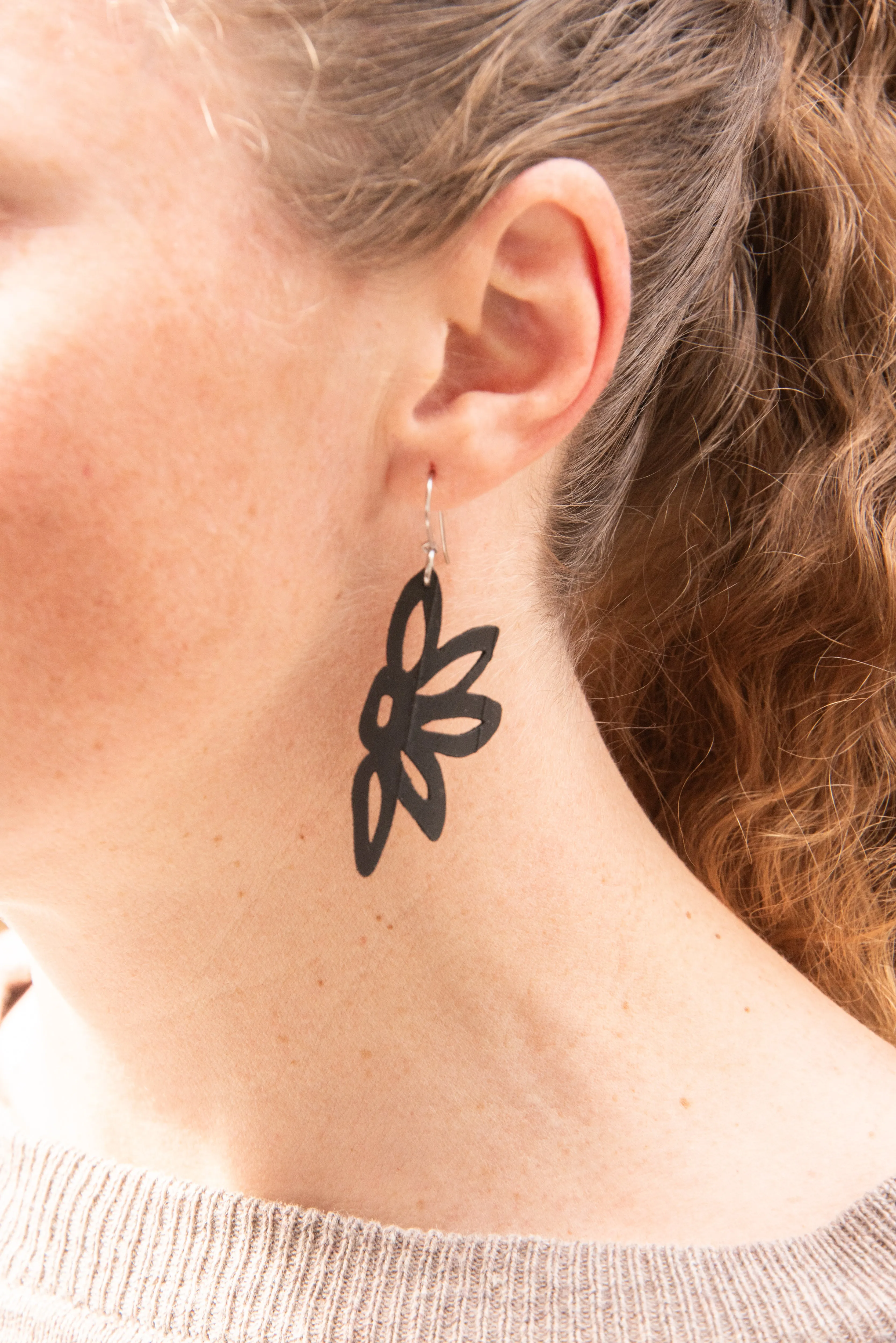 half flower rubber earring