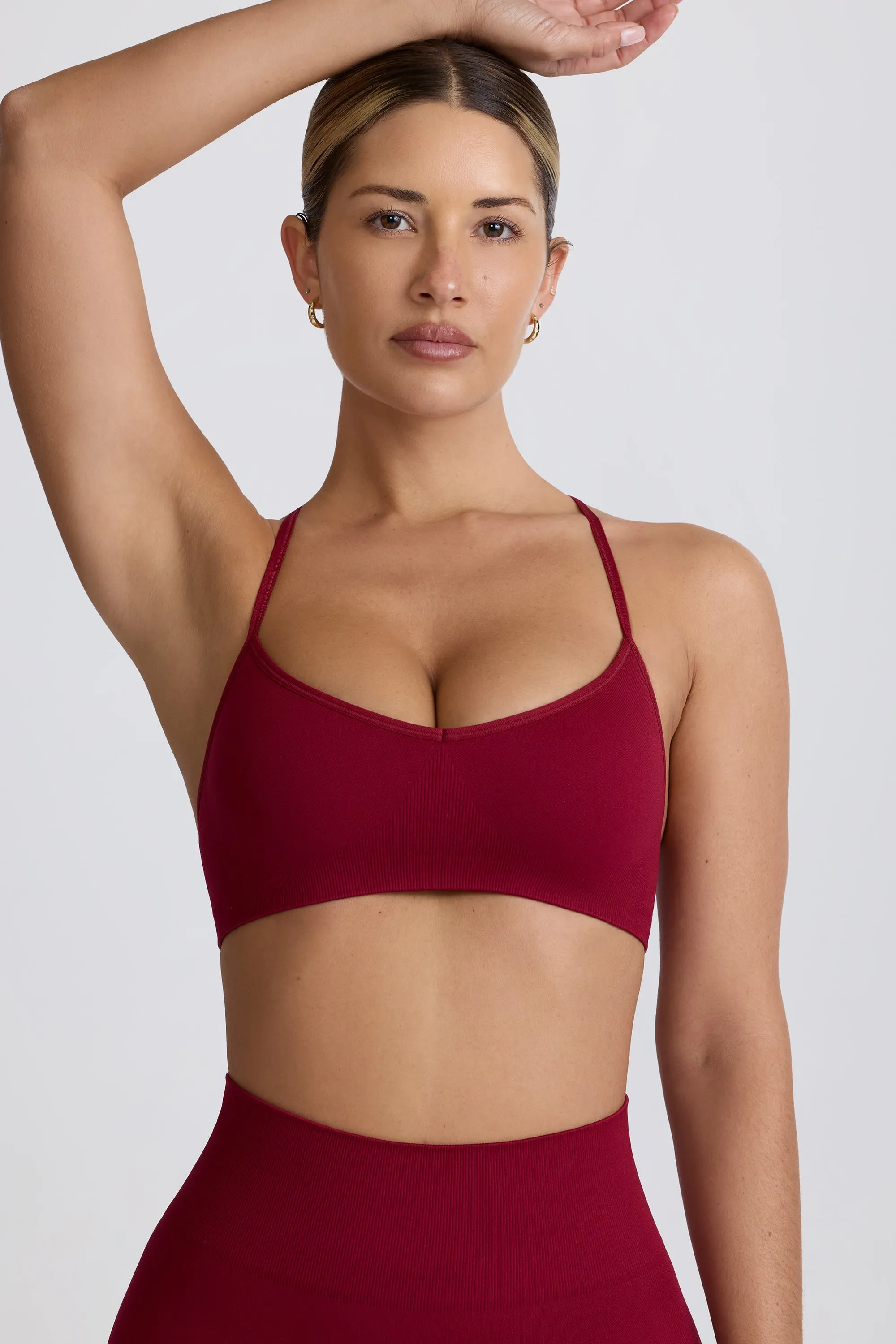 Super Sculpt Seamless Cross-Back Sports Bra in Burgundy