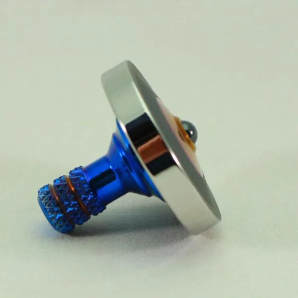 Two Step - Blacked out and polished stainless steel with a heat anodized titanium spindle #7
